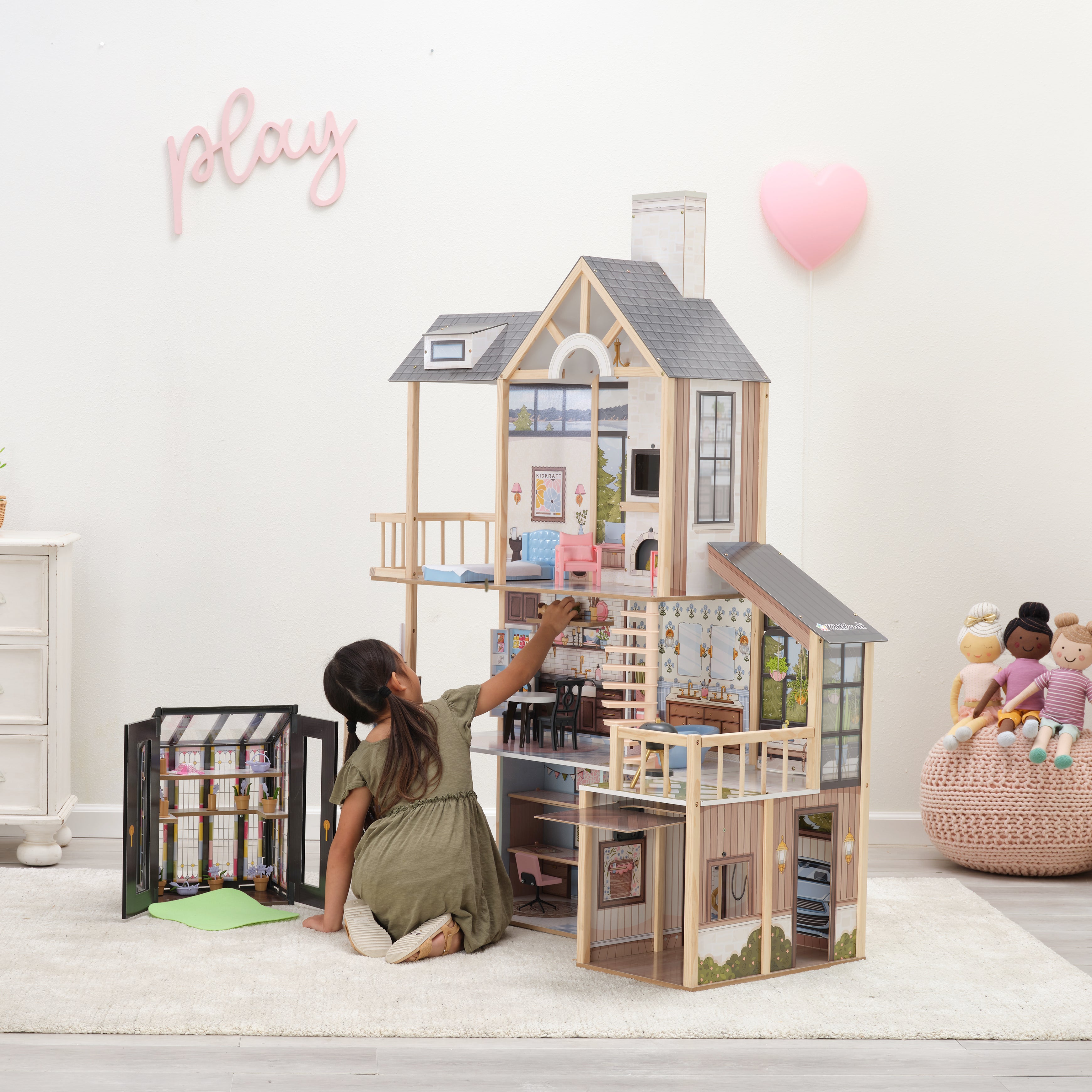 KidKraft Lakeview Villa dollhouse rooftop patio and balcony; KidKraft Lakeview Villa dollhouse interior rooms; KidKraft Lakeview Villa dollhouse greenhouse play feature.